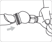 Inserting the glans of the penis into PeniMaster PRO with pump ball pressed in